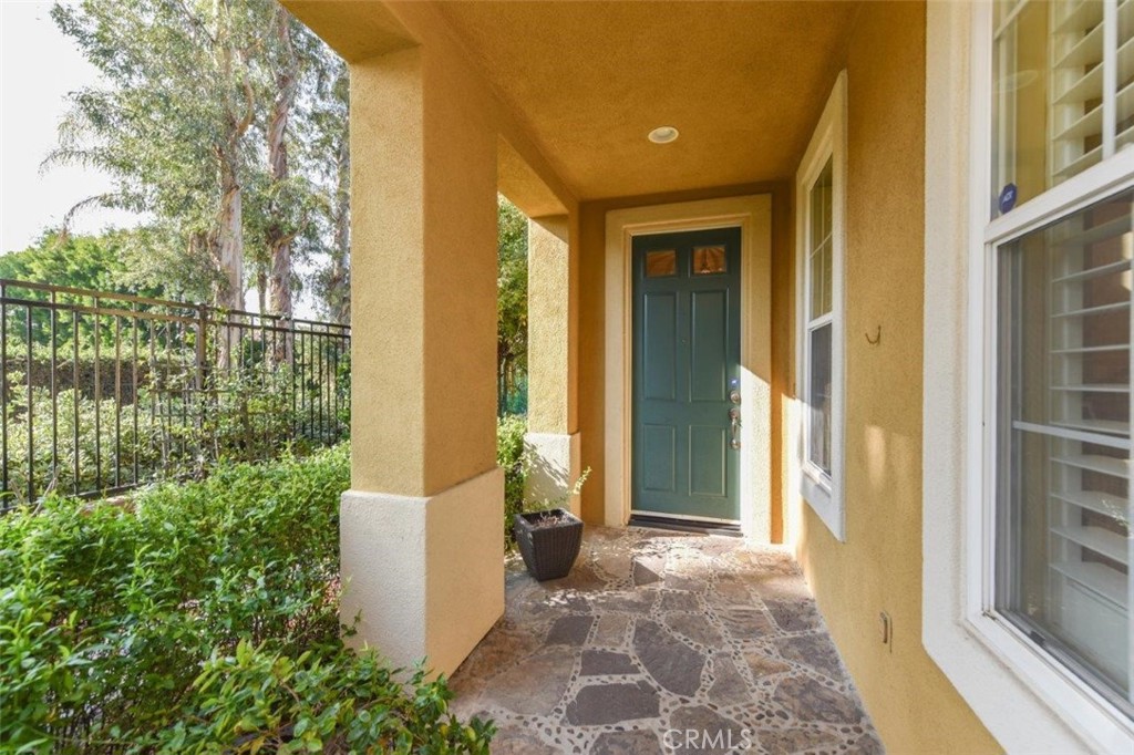 3 Plumbago Irvine, CA 92620 - Photo 7 of 51 front view of a house with a glass door