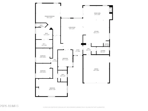 a view of a yard in front of a house with a large tree