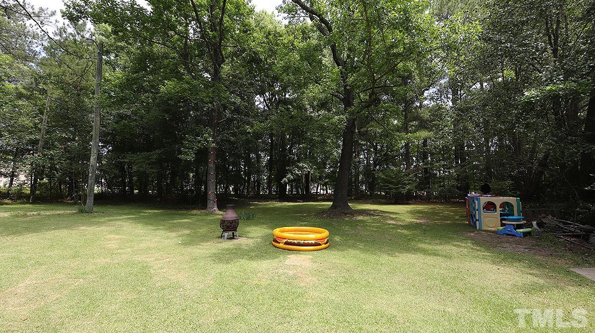 7121 Riley Hill Road Wendell, NC 27591 - Photo 15 of 16 a view of swimming pool with a yard