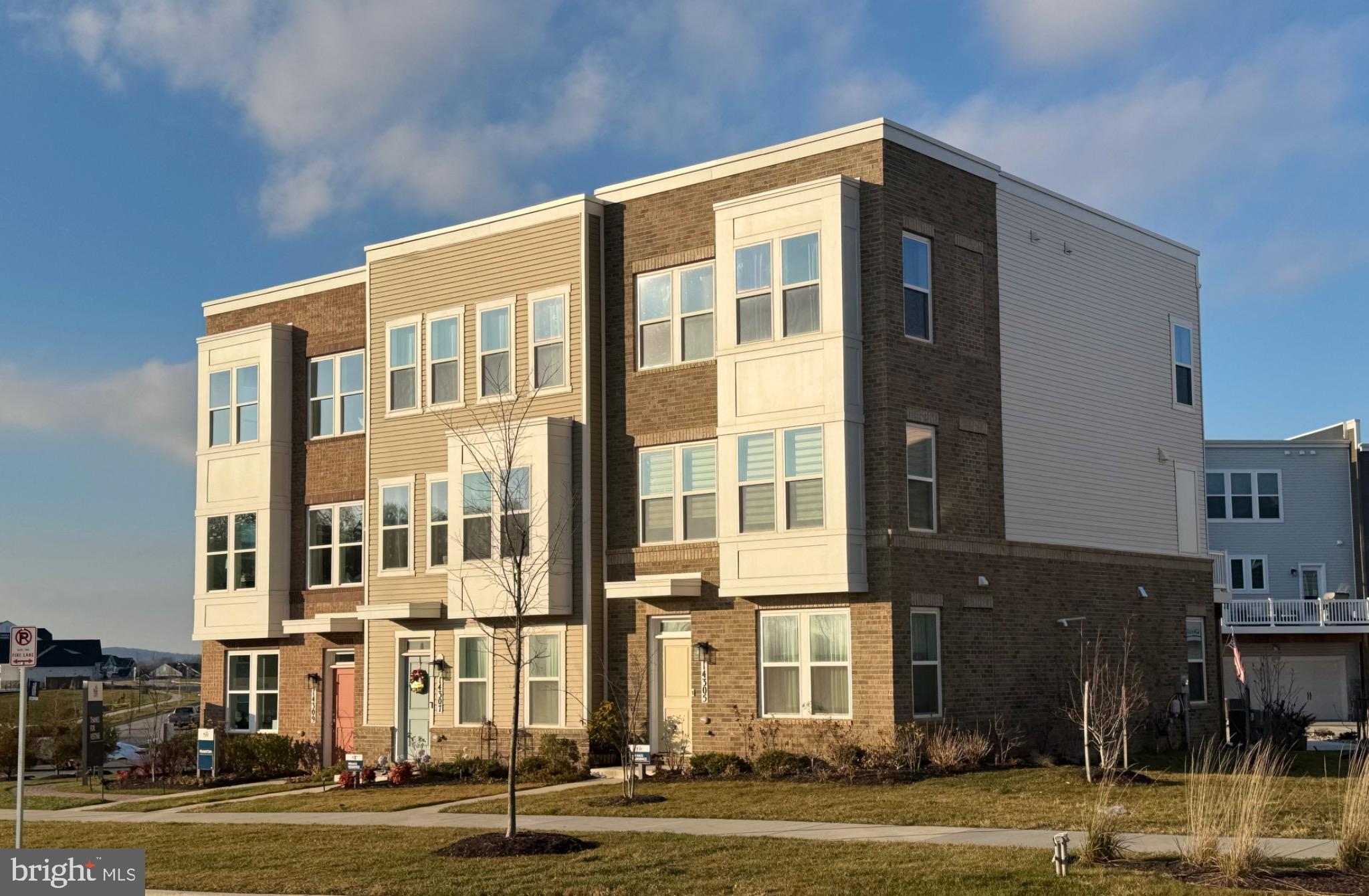 Modern end unit (R side) with brick facade