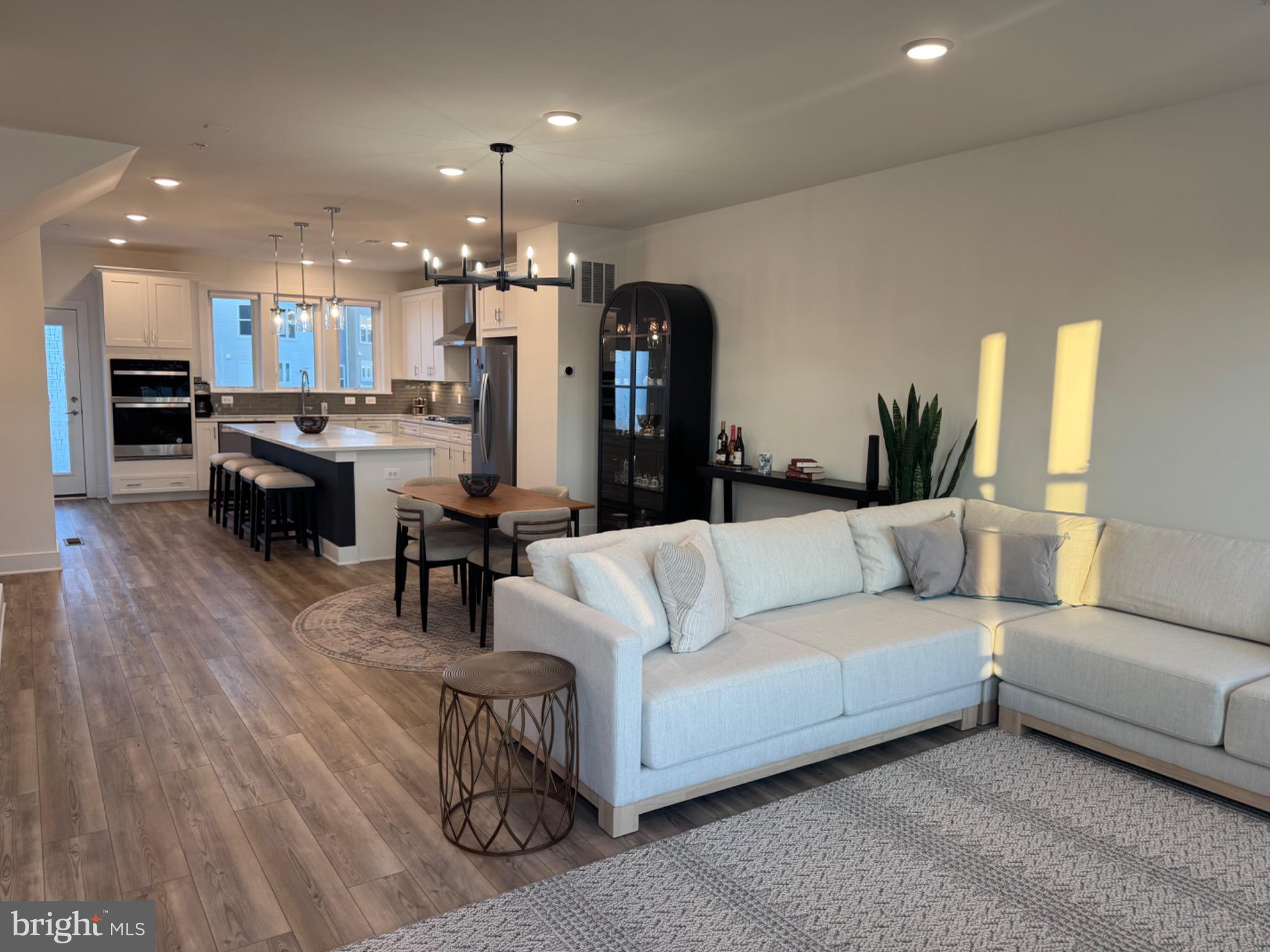 14305 Dowitcher Way Boyds, MD 20841 - Photo 2 of 27 Open-concept living space with light.