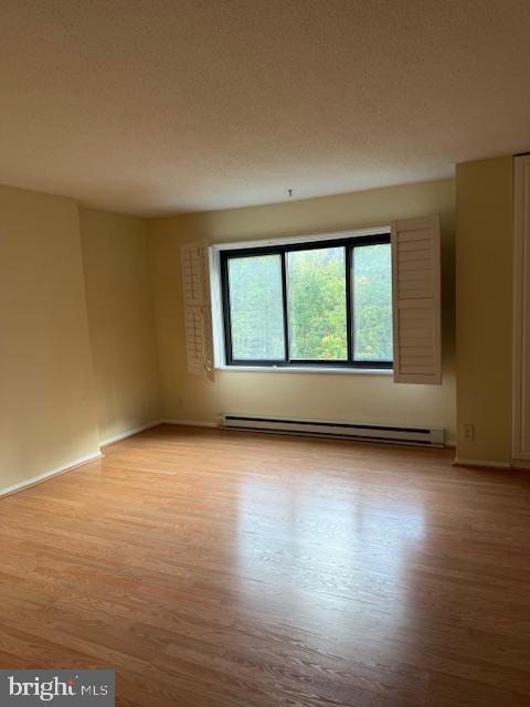 205 Yoakum Parkway, Unit 626 Alexandria, VA 22304 - Photo 29 of 83 a view of a room with wooden floor and window