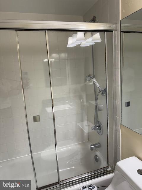 205 Yoakum Parkway, Unit 626 Alexandria, VA 22304 - Photo 35 of 83 a bathroom with a glass shower door