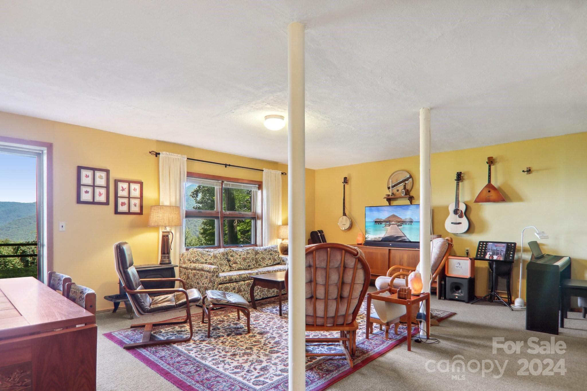 1685 Setzercove Road Maggie Valley, NC 28751 - Photo 26 of 42 a view of a livingroom with furniture