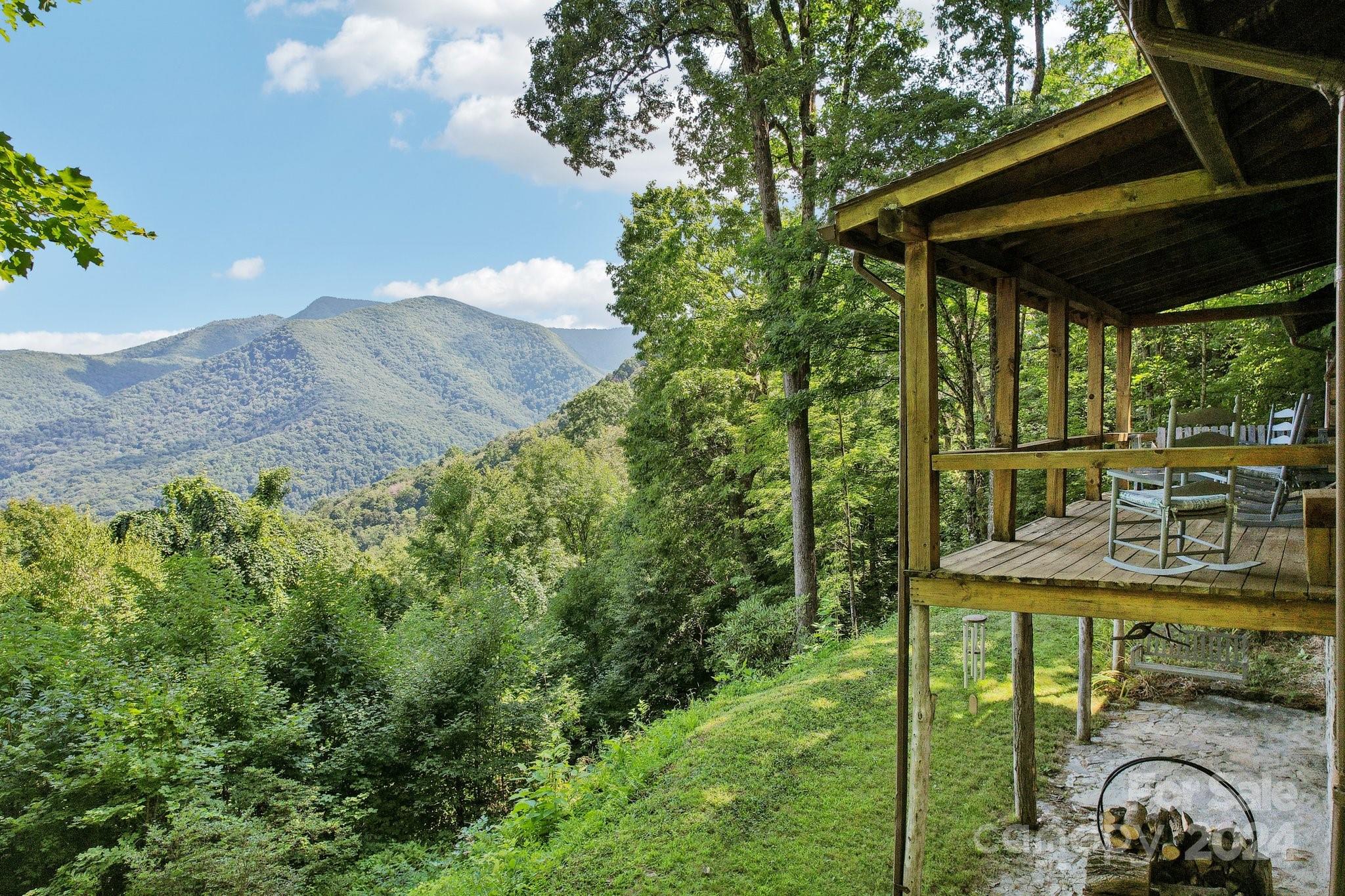 1685 Setzercove Road Maggie Valley, NC 28751 - Photo 36 of 42 a view of backyard with seating space