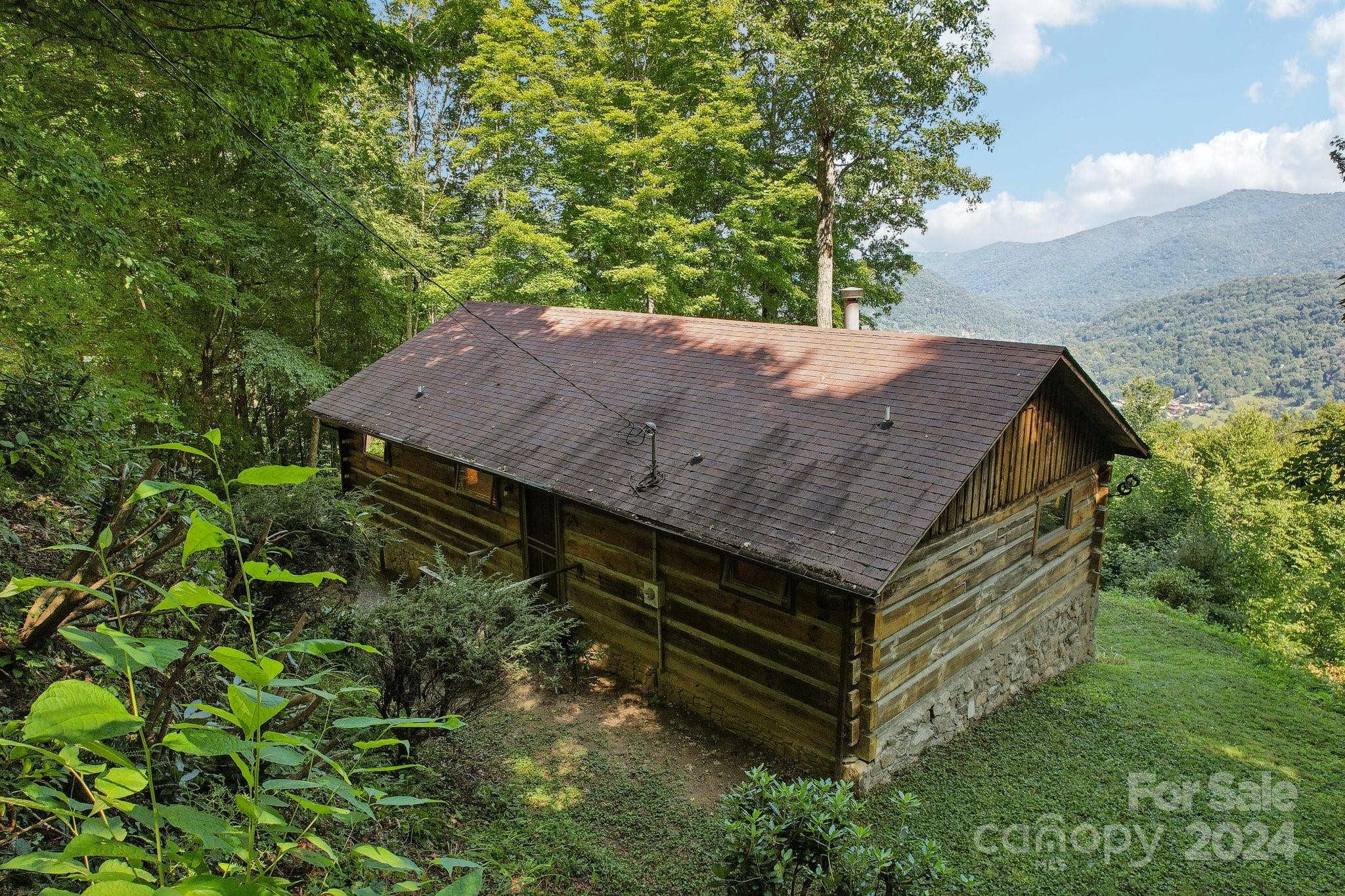 1685 Setzercove Road Maggie Valley, NC 28751 - Photo 38 of 42 a view of a wooden floor with a dry back yard