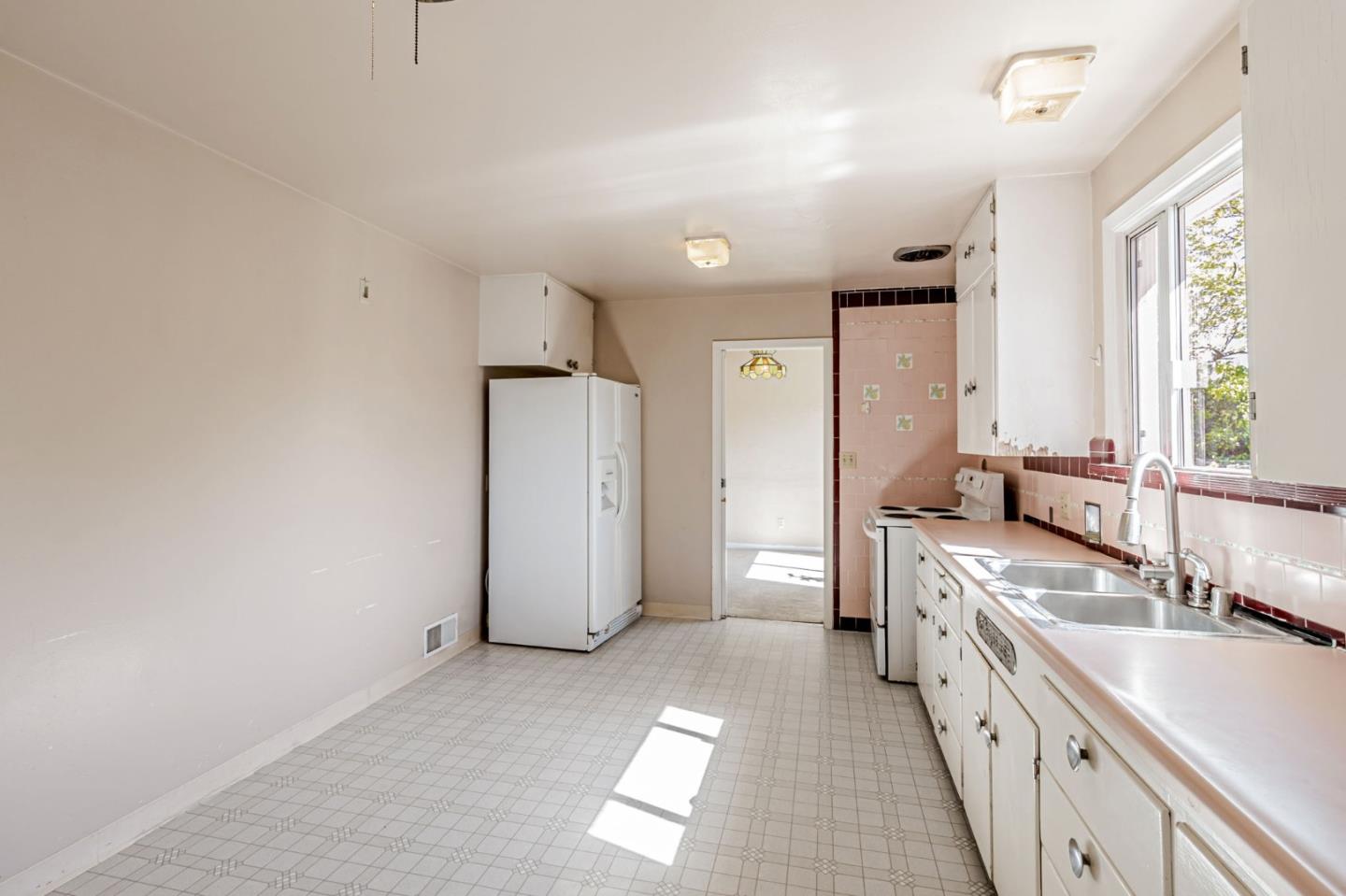 167 North Whisman Road Mountain View, CA 94043 - Photo 12 of 49 a large bathroom with a double vanity sink a mirror and a bathtub