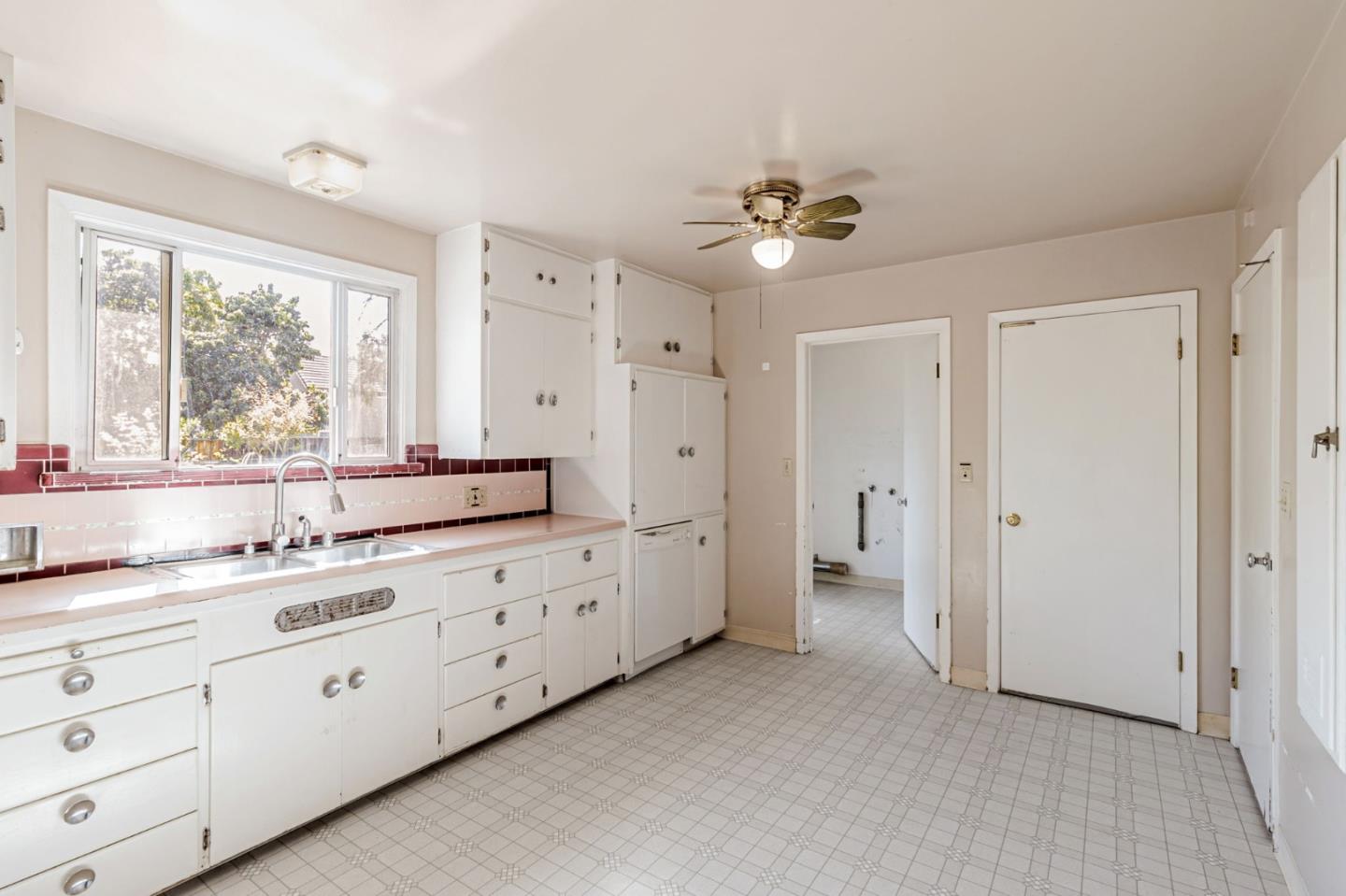 167 North Whisman Road Mountain View, CA 94043 - Photo 13 of 49 a large white bathroom with a double vanity sink a large mirror and a bathtub