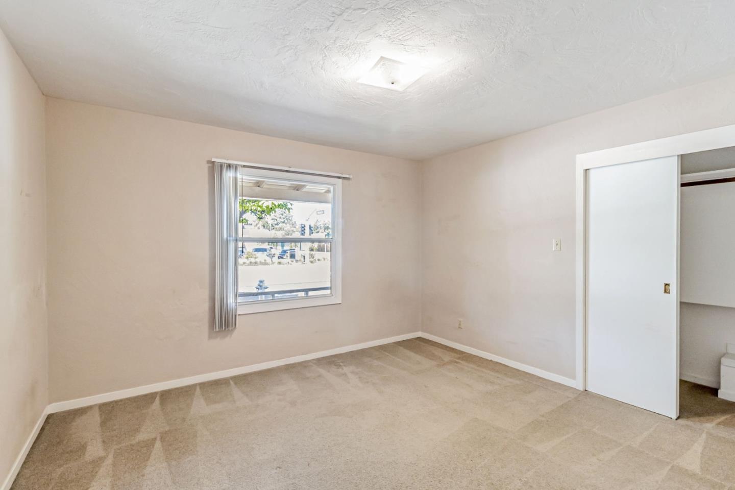 167 North Whisman Road Mountain View, CA 94043 - Photo 14 of 49 an empty room with a window