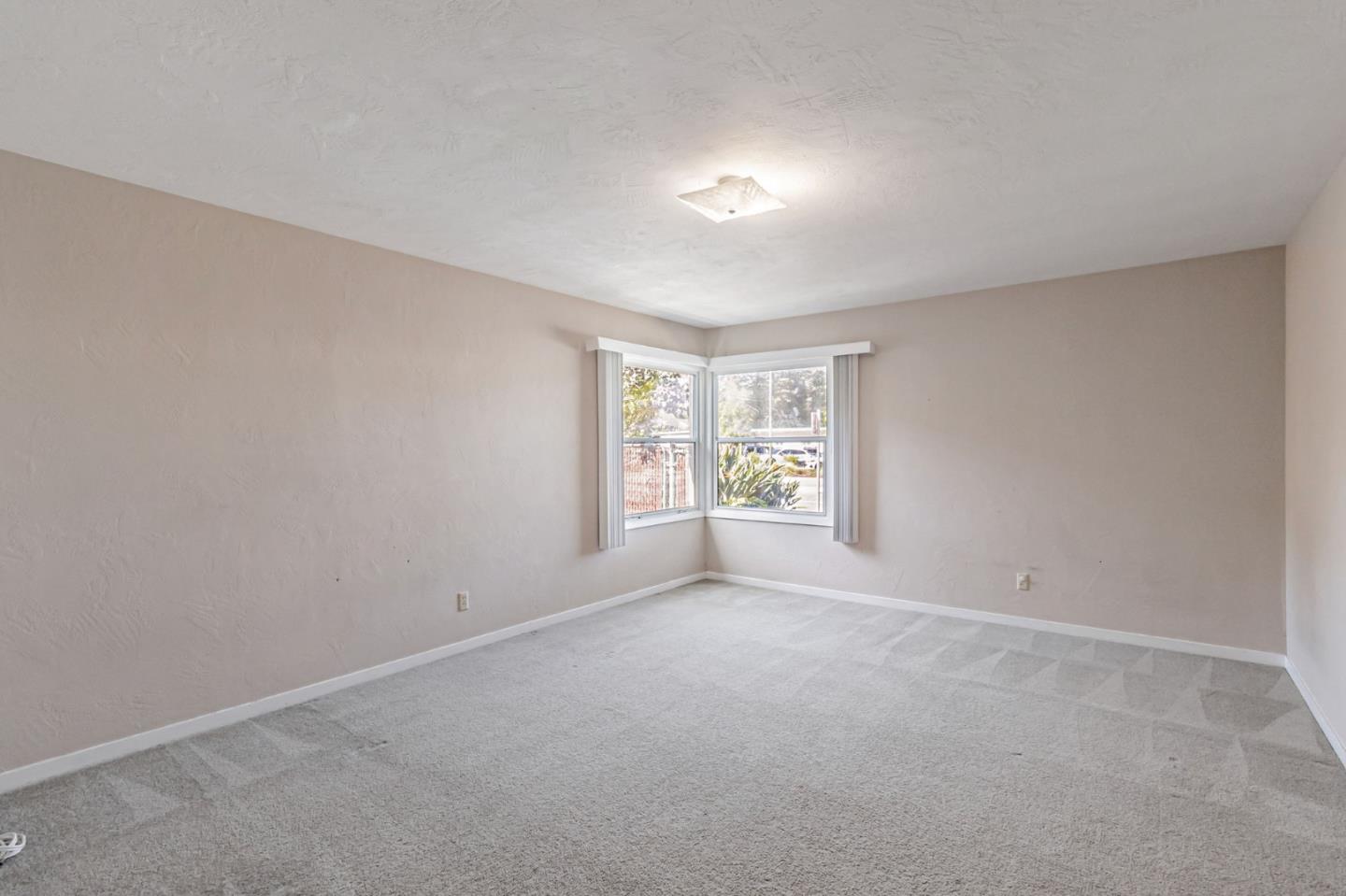 167 North Whisman Road Mountain View, CA 94043 - Photo 16 of 49 an empty room with windows