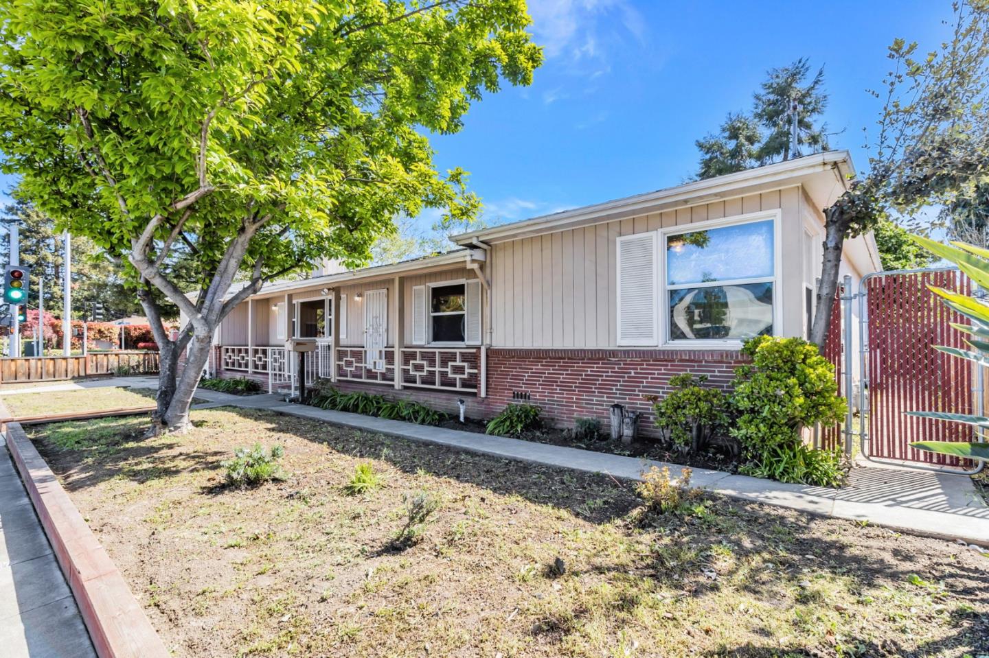167 North Whisman Road Mountain View, CA 94043 - Photo 2 of 49 a view of a house with a yard
