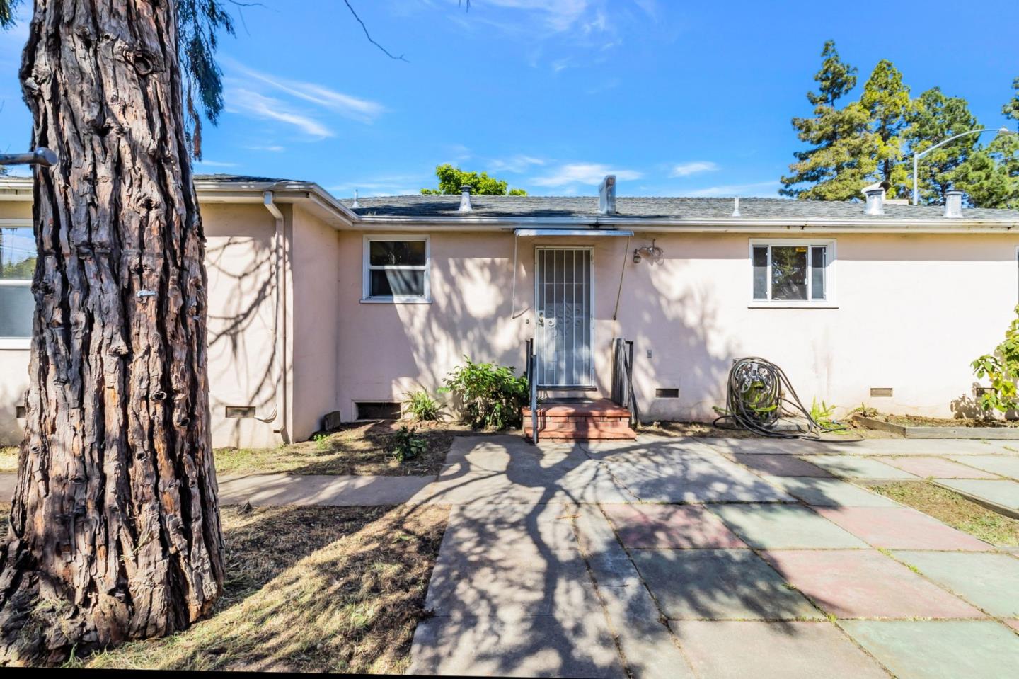 167 North Whisman Road Mountain View, CA 94043 - Photo 23 of 49 a front view of a house with a yard