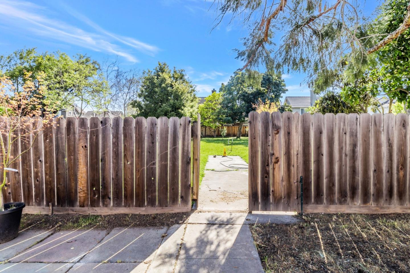 167 North Whisman Road Mountain View, CA 94043 - Photo 28 of 49 a view of a small yard with wooden fence