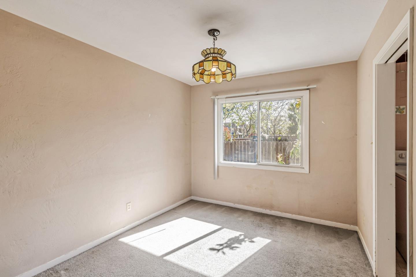 167 North Whisman Road Mountain View, CA 94043 - Photo 8 of 49 a view of an empty room with a window