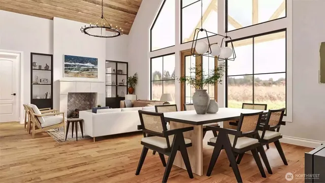 a dining room with wooden floor a chandelier a glass table and chairs