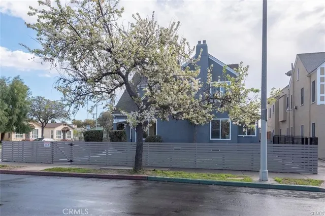 a view of a street in front of a building