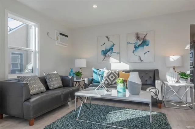 a living room with furniture and a table