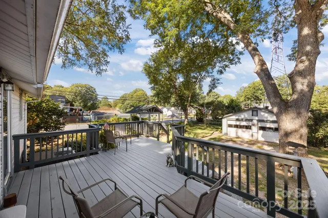 a view of a city street from a balcony
