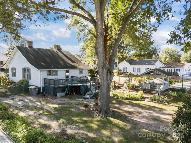 a view of swimming pool from a garden