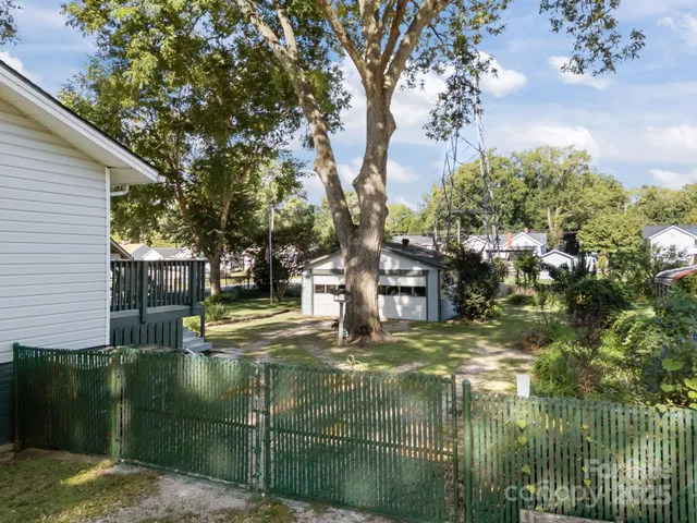 an aerial view of residential house with outdoor space