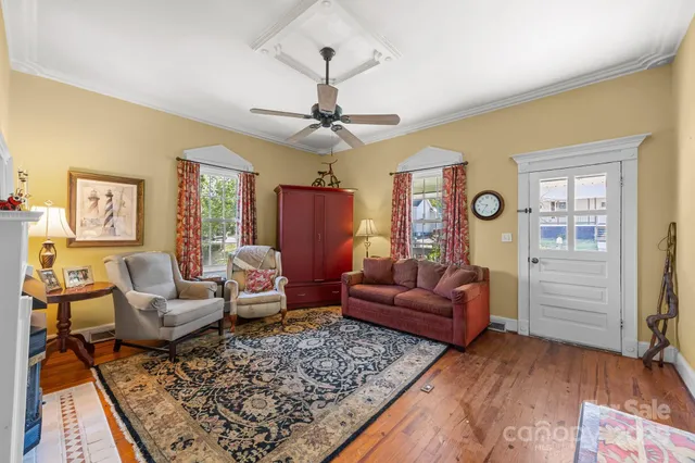 a living room with furniture or couch and a window