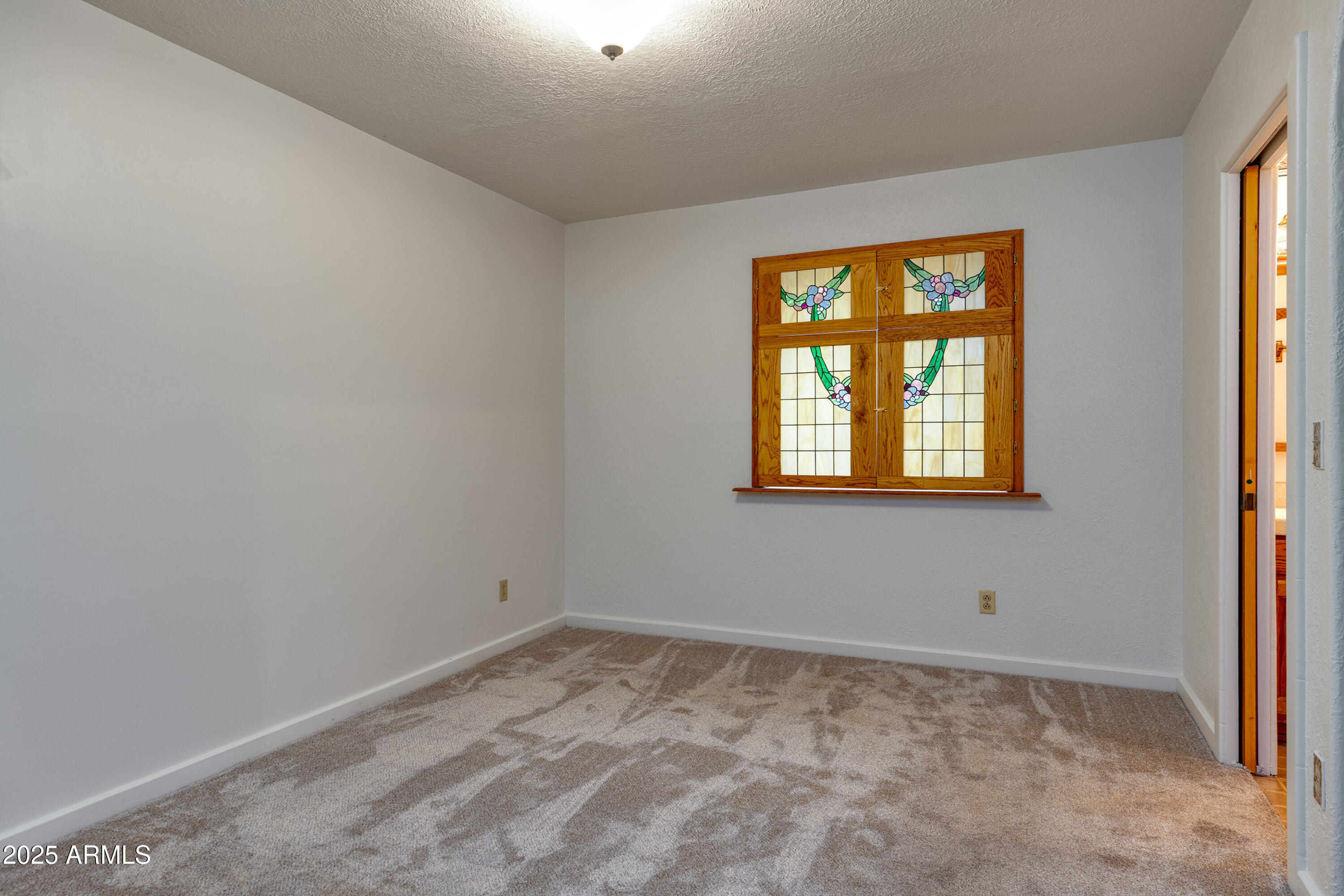 5382 Pine Dawn Road Lakeside, AZ 85929 - Photo 22 of 38 an empty room with a window