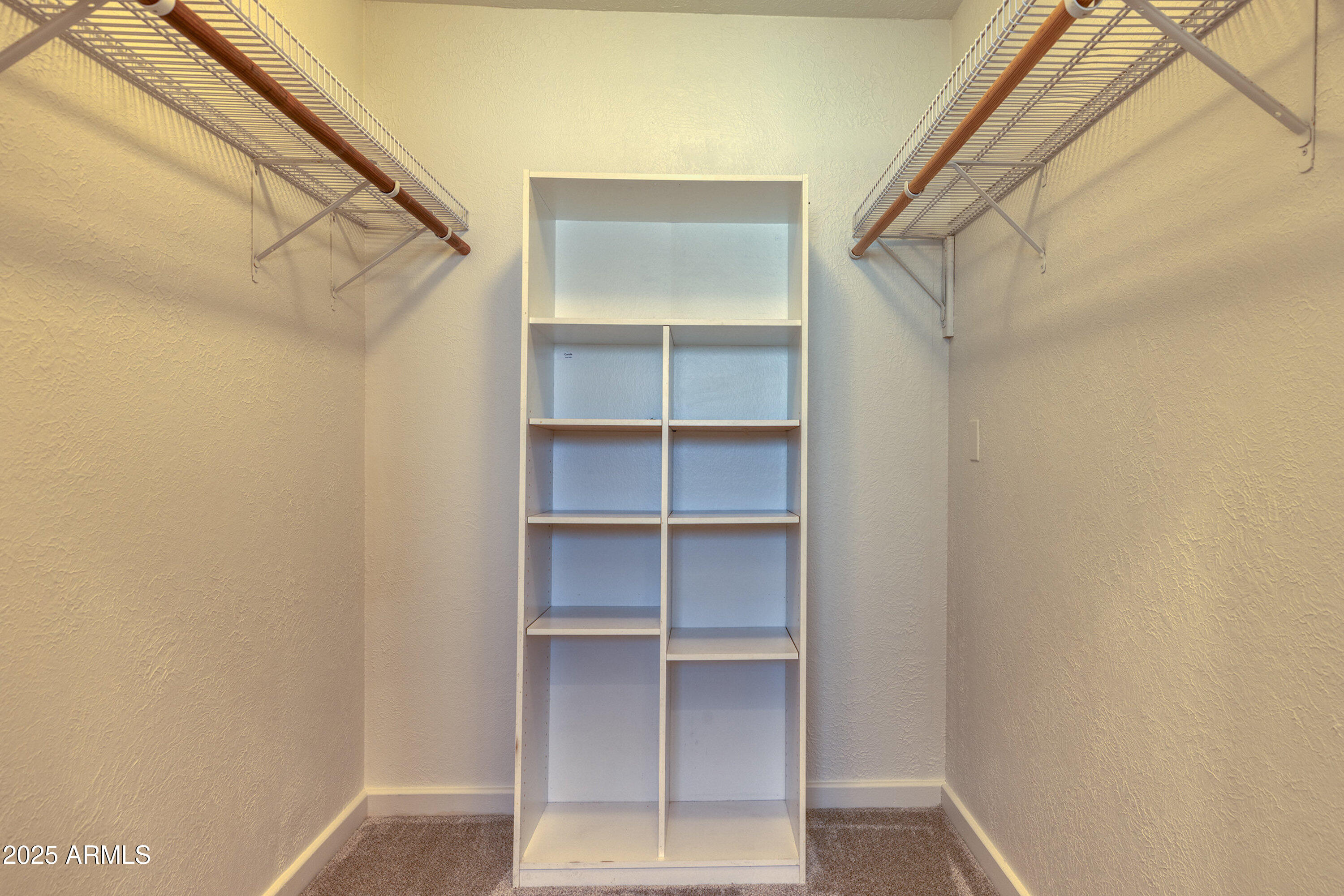 5382 Pine Dawn Road Lakeside, AZ 85929 - Photo 24 of 38 a view of walk in closet with empty racks