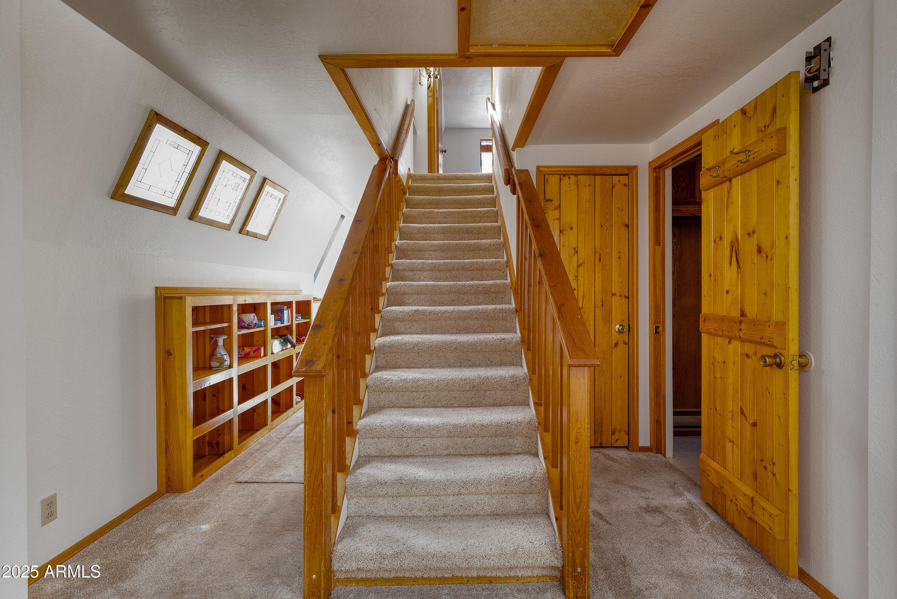 5382 Pine Dawn Road Lakeside, AZ 85929 - Photo 27 of 38 a view of entryway with wooden floor and a front door