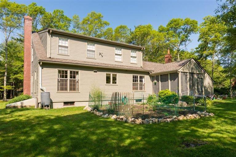 110 Olde Knoll Road Marion, MA 02738 - Photo 4 of 12 a view of a house with a yard