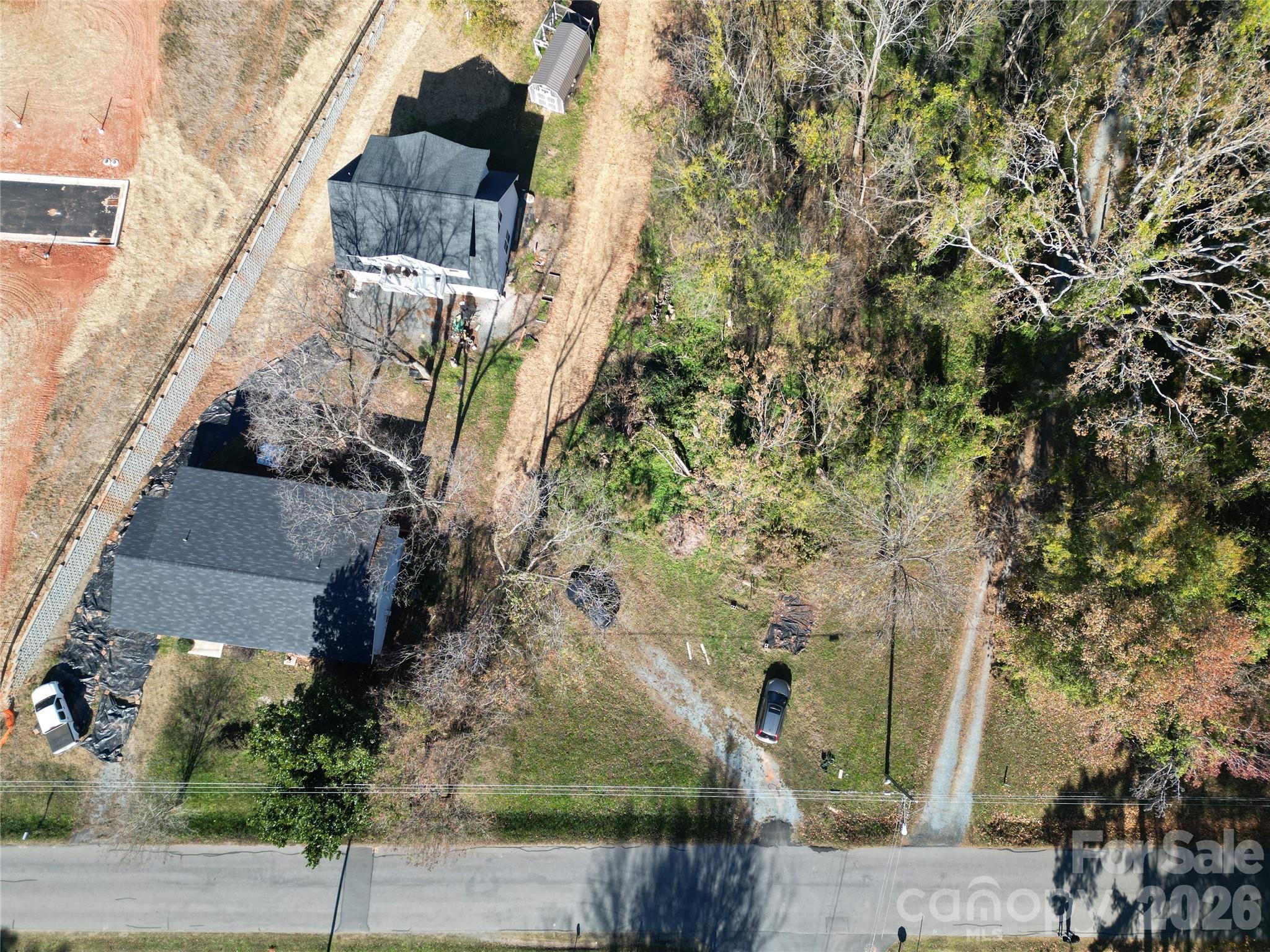 Tbd Blythe Mill Road Waxhaw, NC 28173 - Photo 3 of 8 an aerial view of a house with a yard
