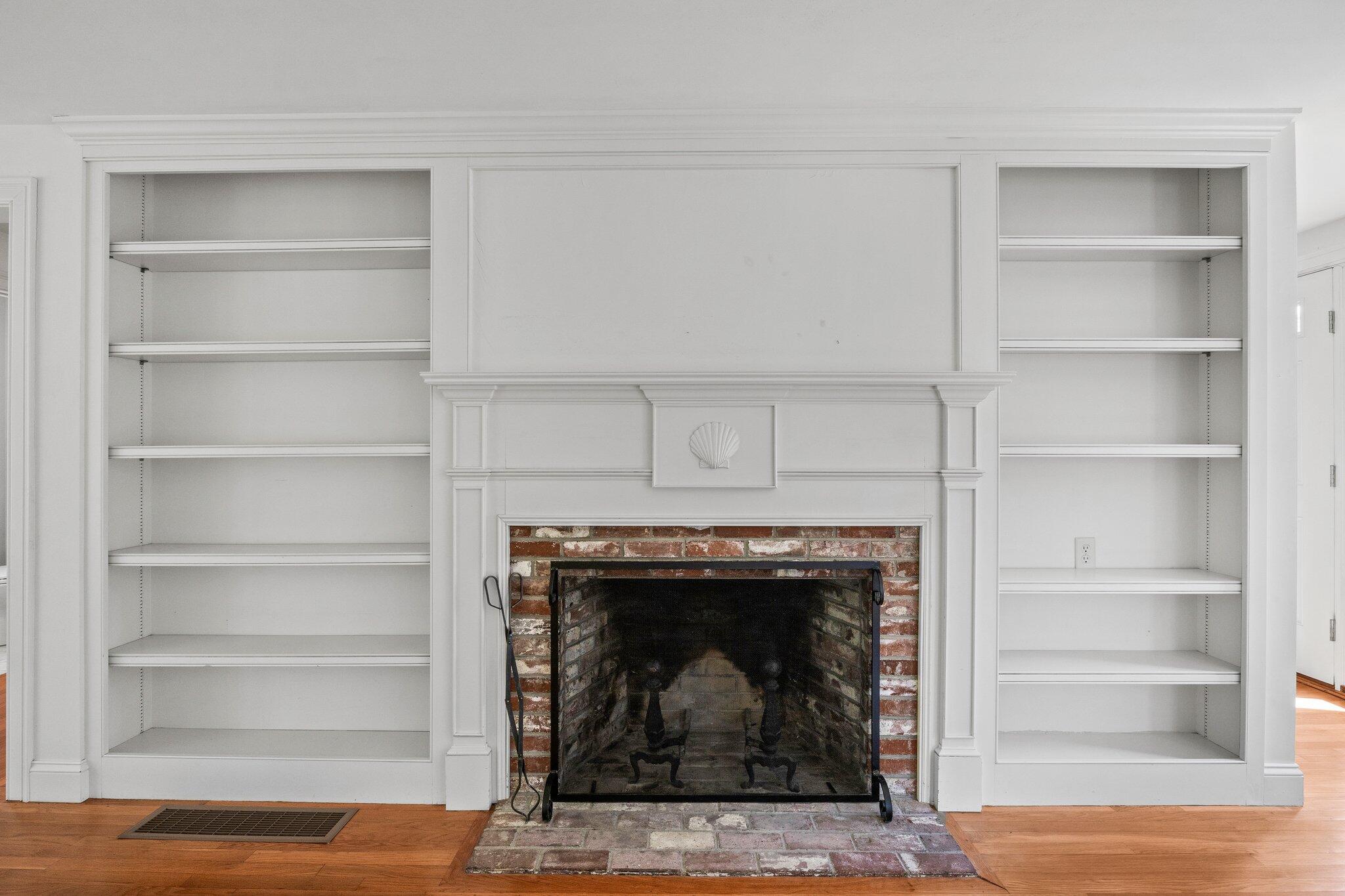 75 Whidah Road Chatham, MA 02650 - Photo 11 of 47 a living room with a fireplace