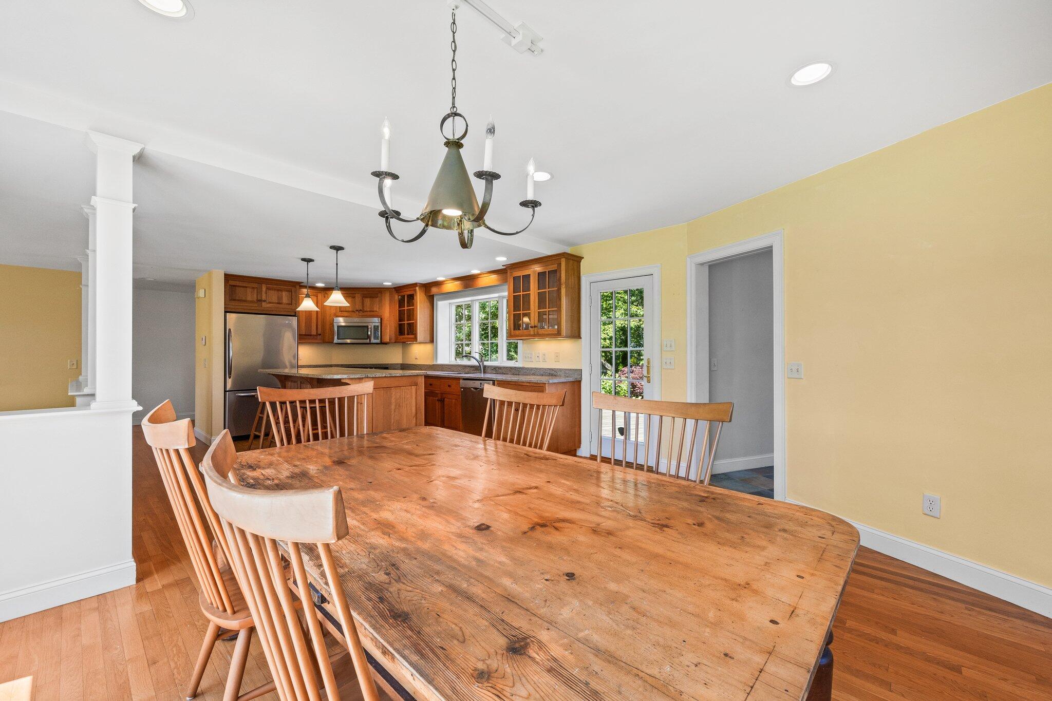 75 Whidah Road Chatham, MA 02650 - Photo 14 of 47 a view of a dining room with furniture window and wooden floor