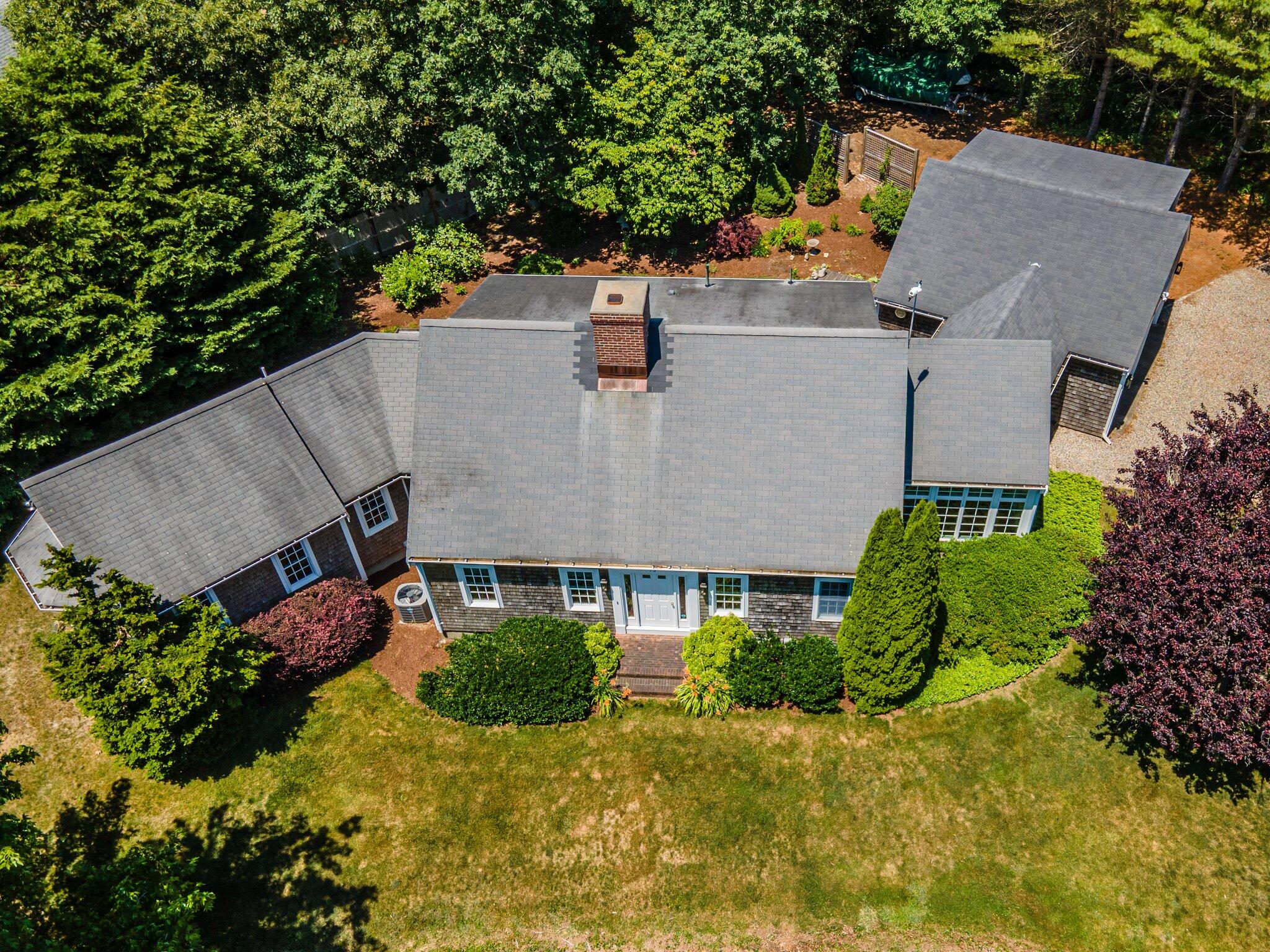 75 Whidah Road Chatham, MA 02650 - Photo 2 of 47 an aerial view of a house with a yard and large tree