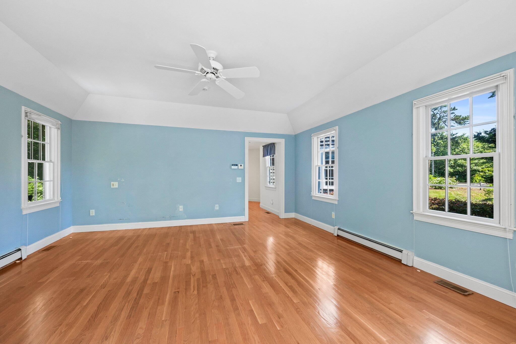 75 Whidah Road Chatham, MA 02650 - Photo 23 of 47 a view of empty room with wooden floor and fan