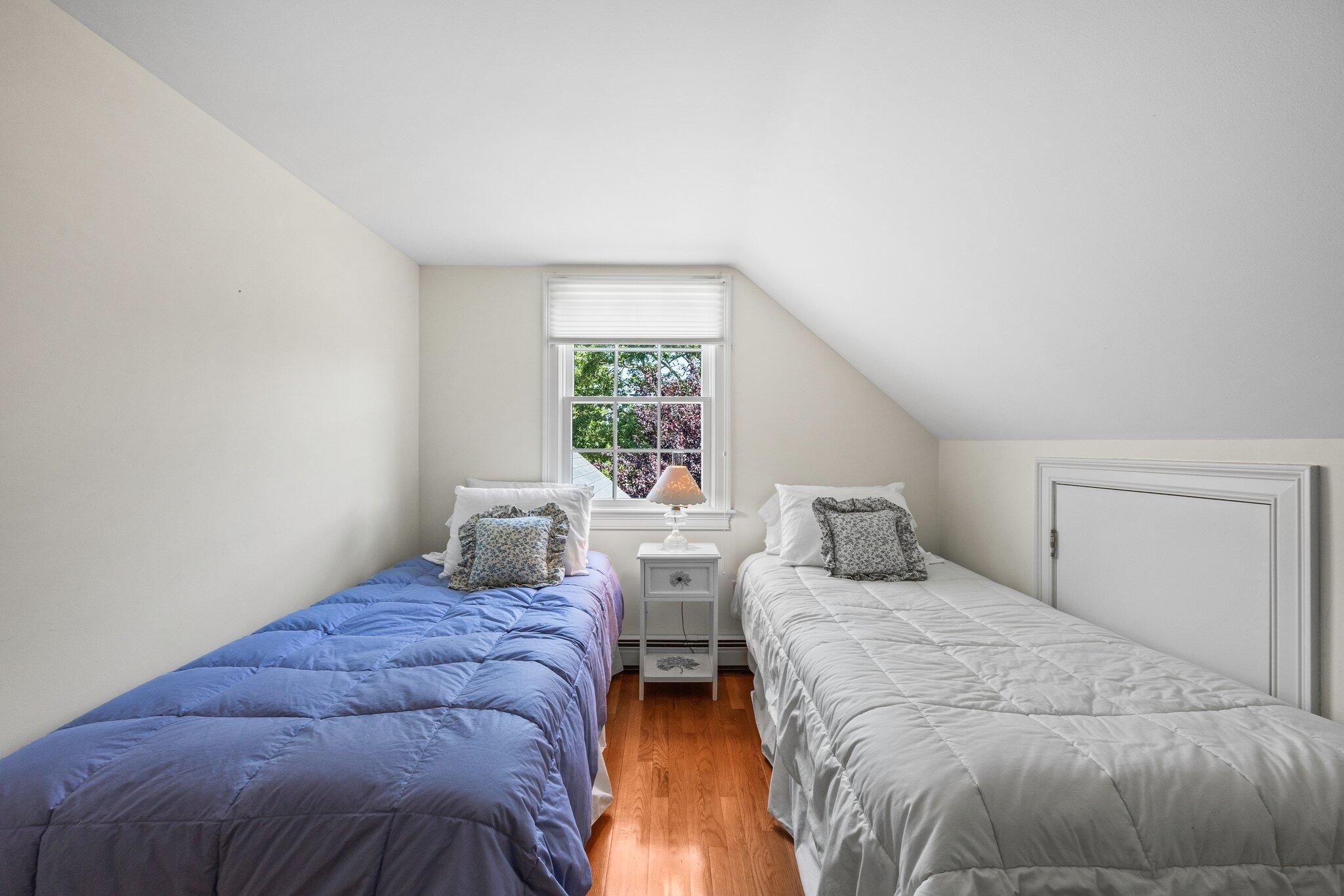 75 Whidah Road Chatham, MA 02650 - Photo 26 of 47 a bedroom with two beds and a large window