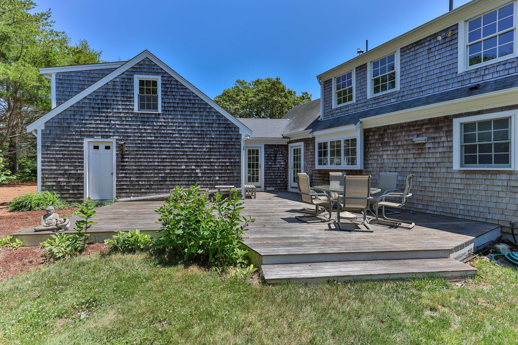 75 Whidah Road Chatham, MA 02650 - Photo 30 of 47 a view of a house with a patio