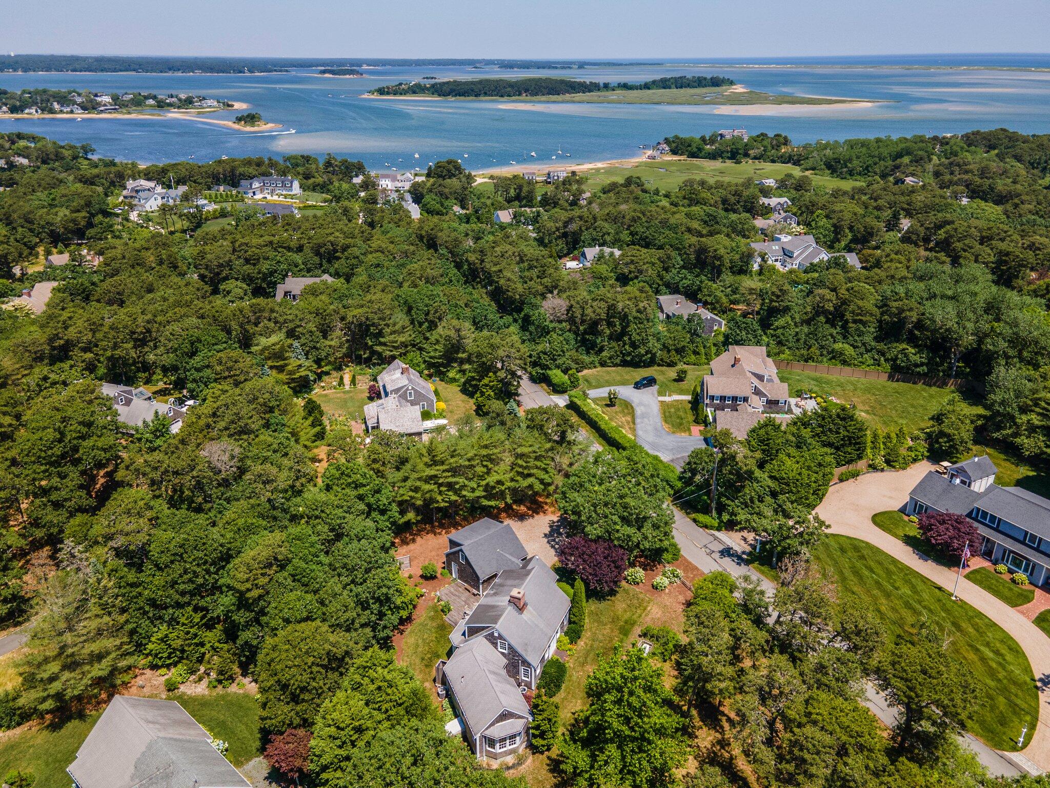 75 Whidah Road Chatham, MA 02650 - Photo 3 of 47 an aerial view of residential houses with outdoor space and trees