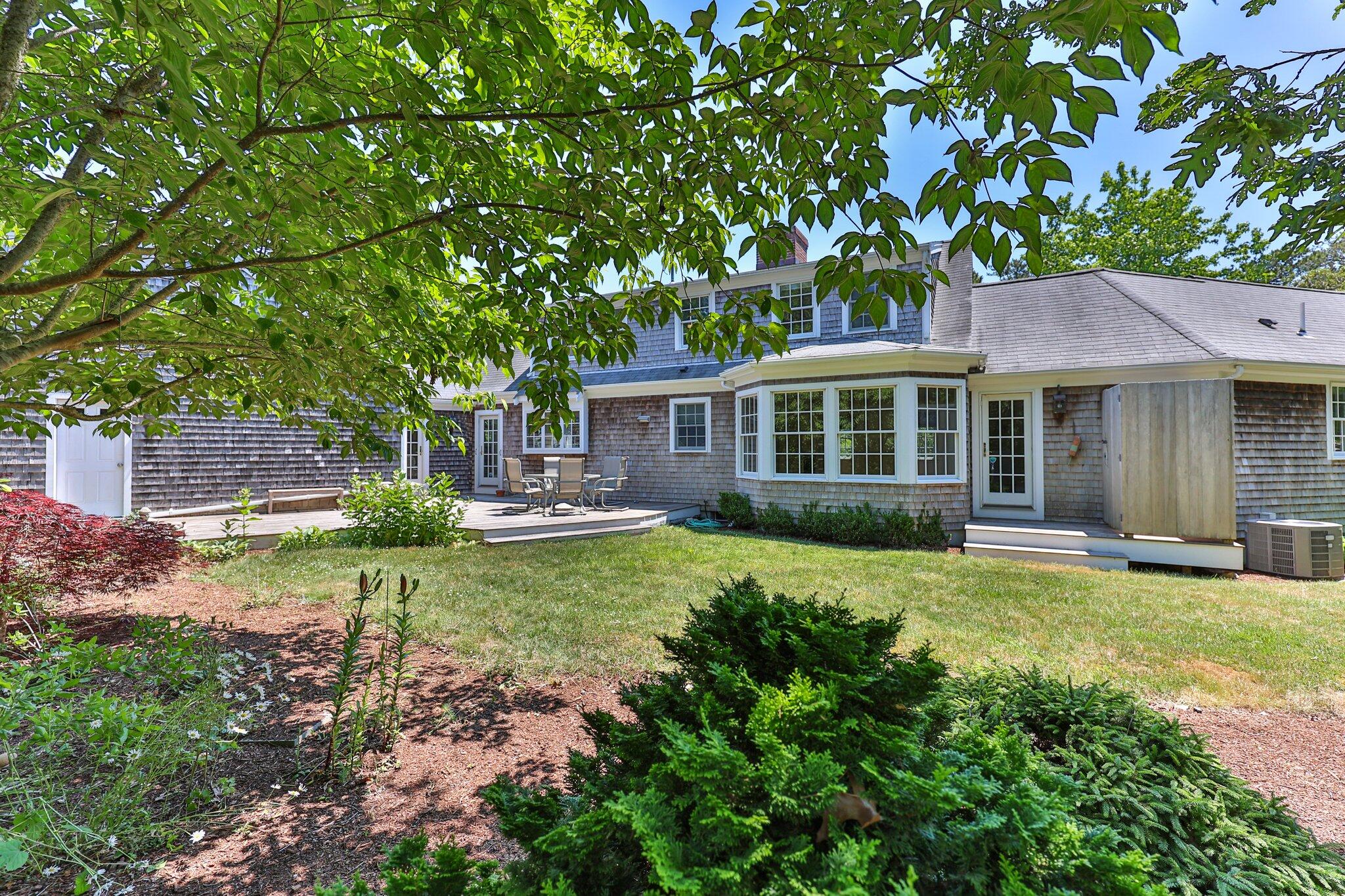 75 Whidah Road Chatham, MA 02650 - Photo 31 of 47 a view of a house with a yard