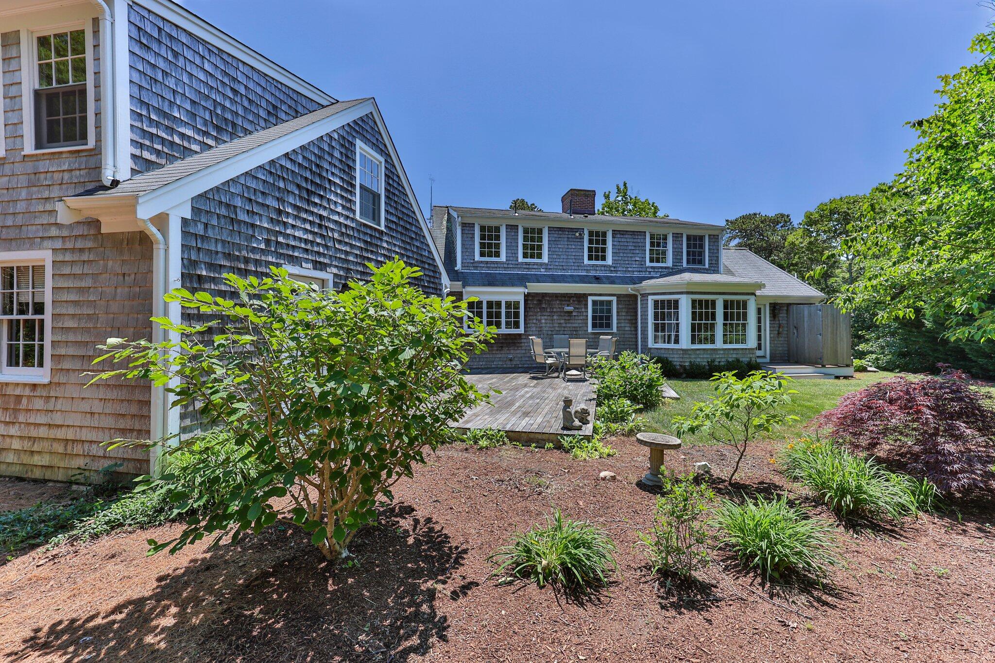 75 Whidah Road Chatham, MA 02650 - Photo 32 of 47 a front view of a house with a yard