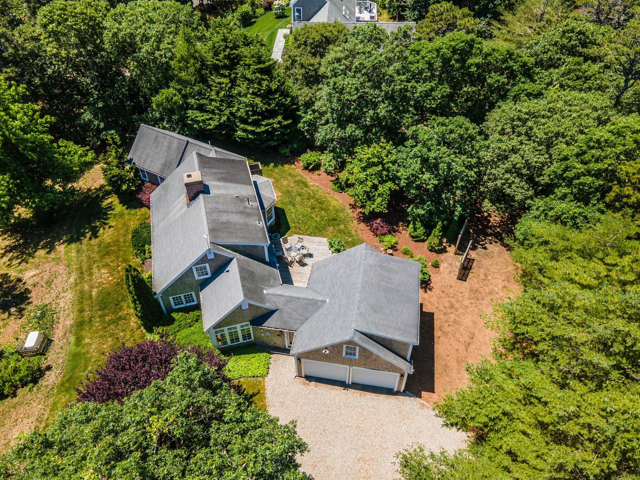 75 Whidah Road Chatham, MA 02650 - Photo 34 of 47 an aerial view of residential house with outdoor space and trees all around