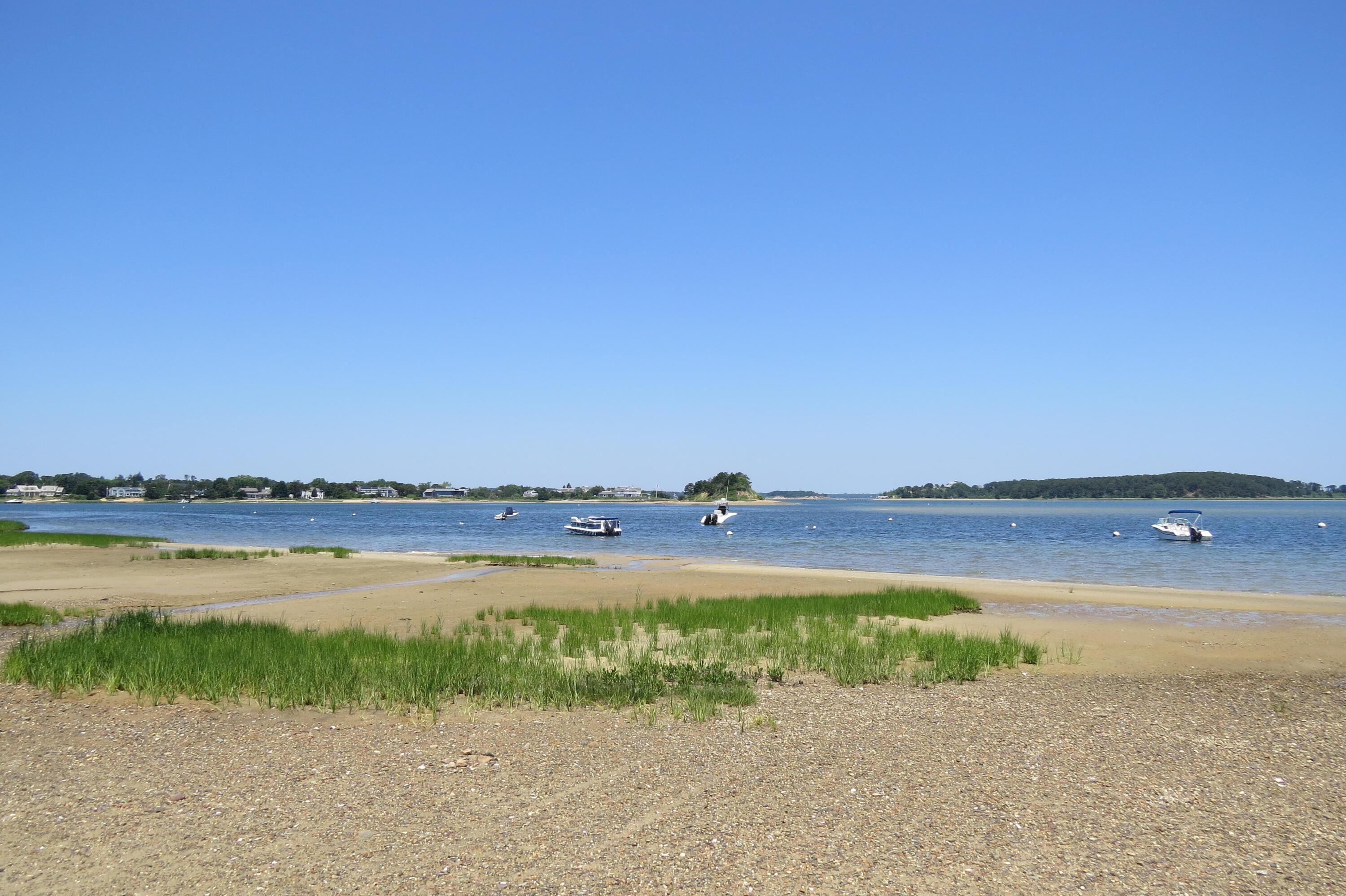 75 Whidah Road Chatham, MA 02650 - Photo 37 of 47 a view of a lake and mountain in the back