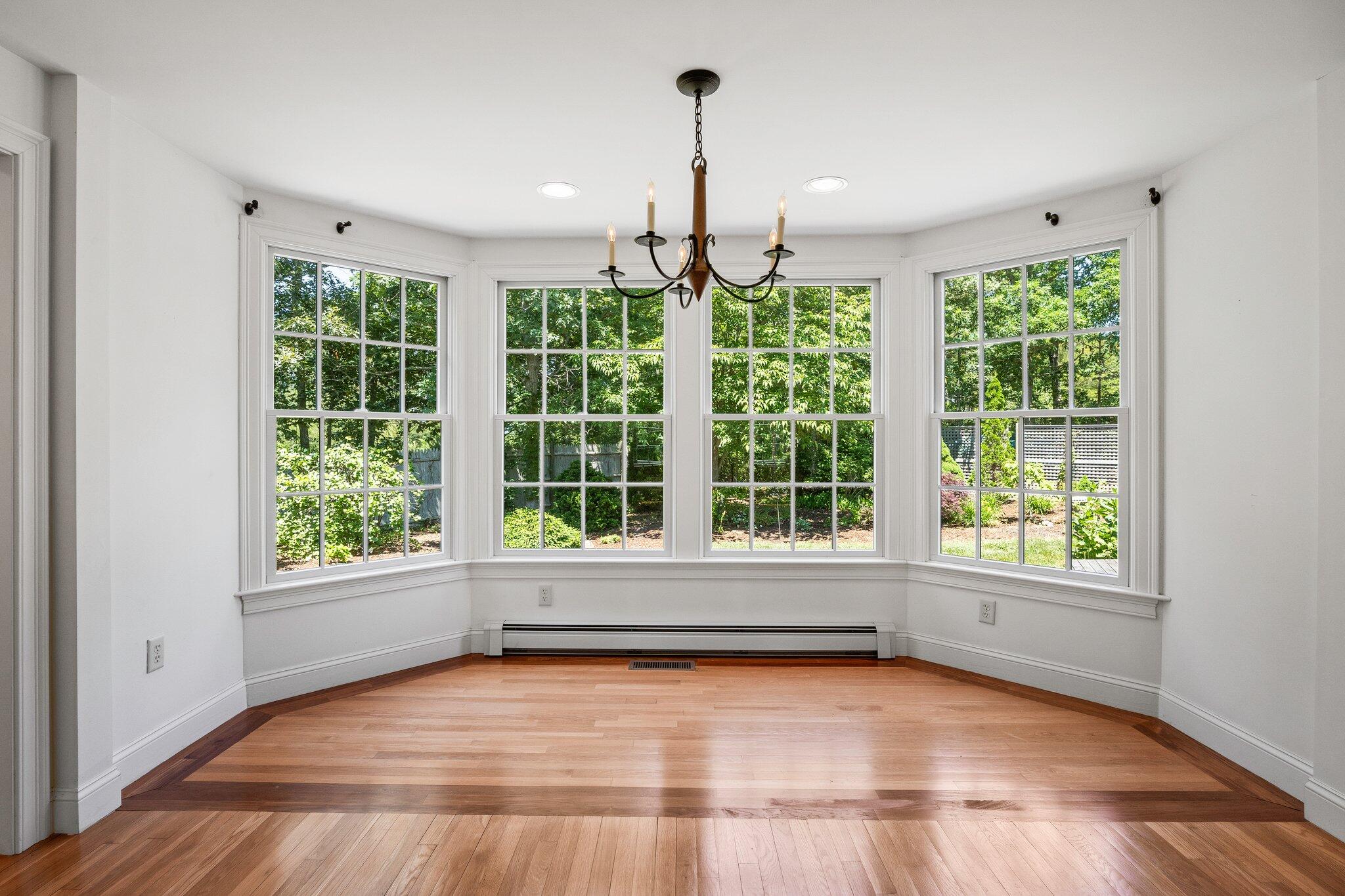 75 Whidah Road Chatham, MA 02650 - Photo 10 of 47 a view of an empty room with wooden floor and a window