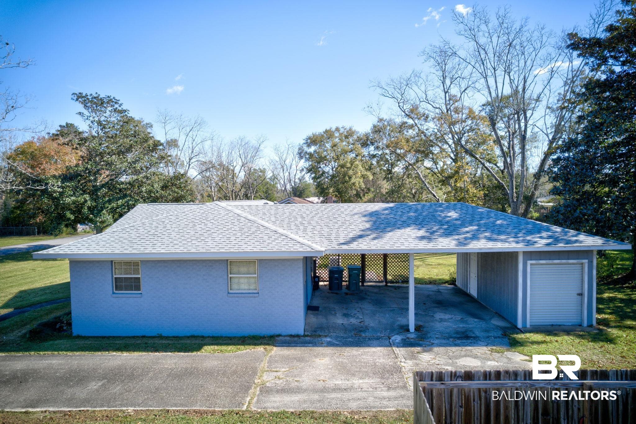 606 East Myrtle Avenue Foley, AL 36535 - Photo 12 of 24 Ranch-style home with a carport