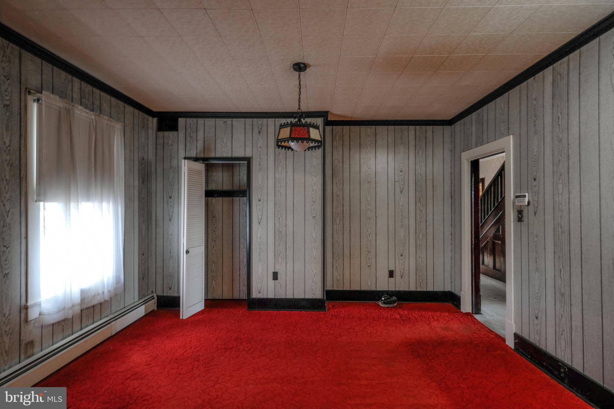 485 Red Bud Road Strasburg, VA 22657 - Photo 22 of 46 an empty room with windows and closet