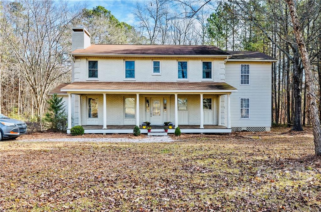 415 Stack Road, Unit P/1&2 Monroe, NC 28112 - Photo 1 of 40 front view of a house with a yard