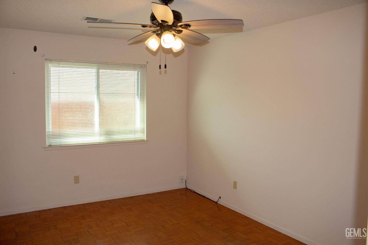 Undisclosed Address Bakersfield, CA 93306 - Photo 14 of 29 an empty room with a window