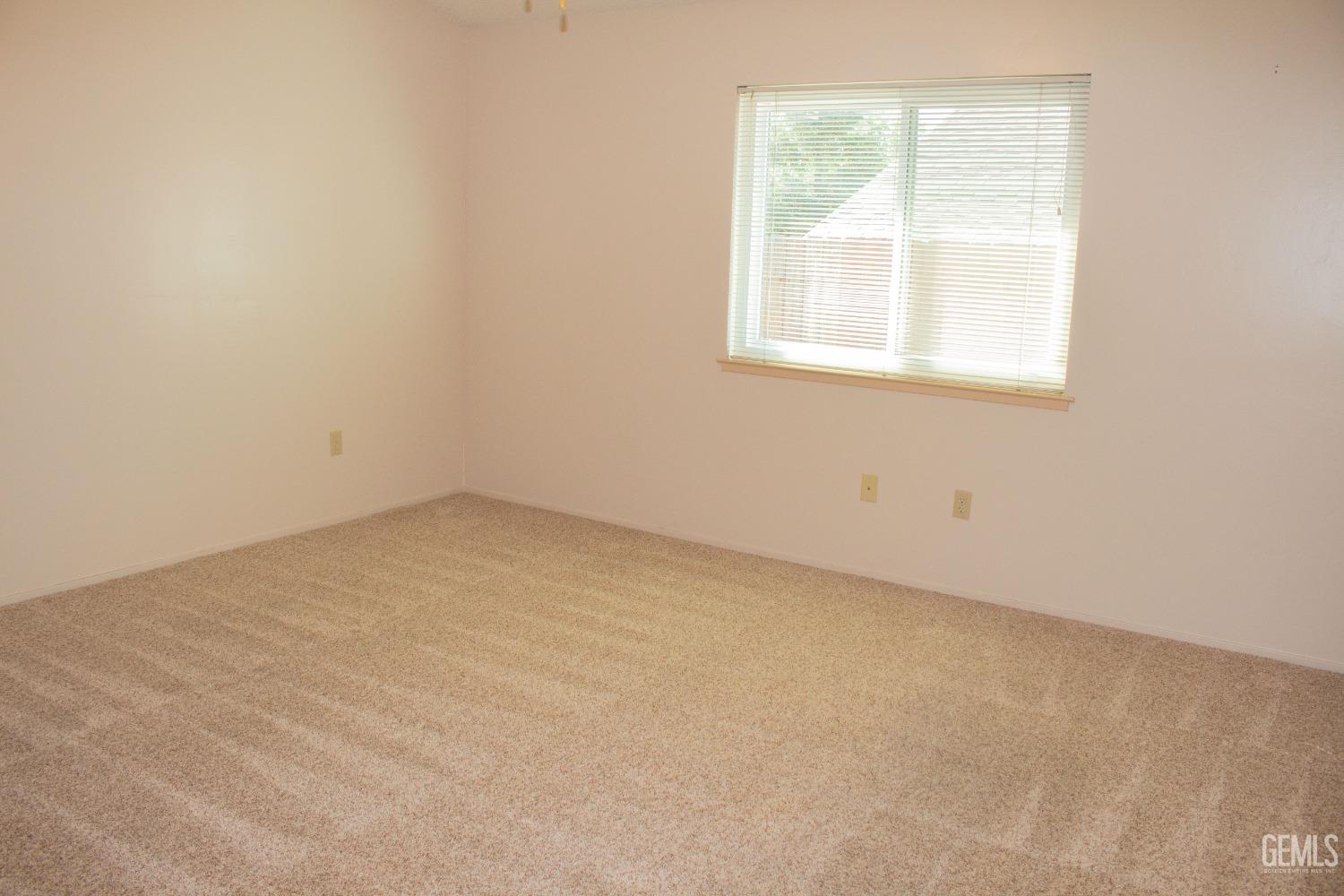 Undisclosed Address Bakersfield, CA 93306 - Photo 18 of 29 an empty room with a window