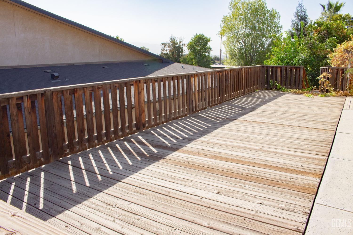 Undisclosed Address Bakersfield, CA 93306 - Photo 24 of 29 a balcony with wooden floor