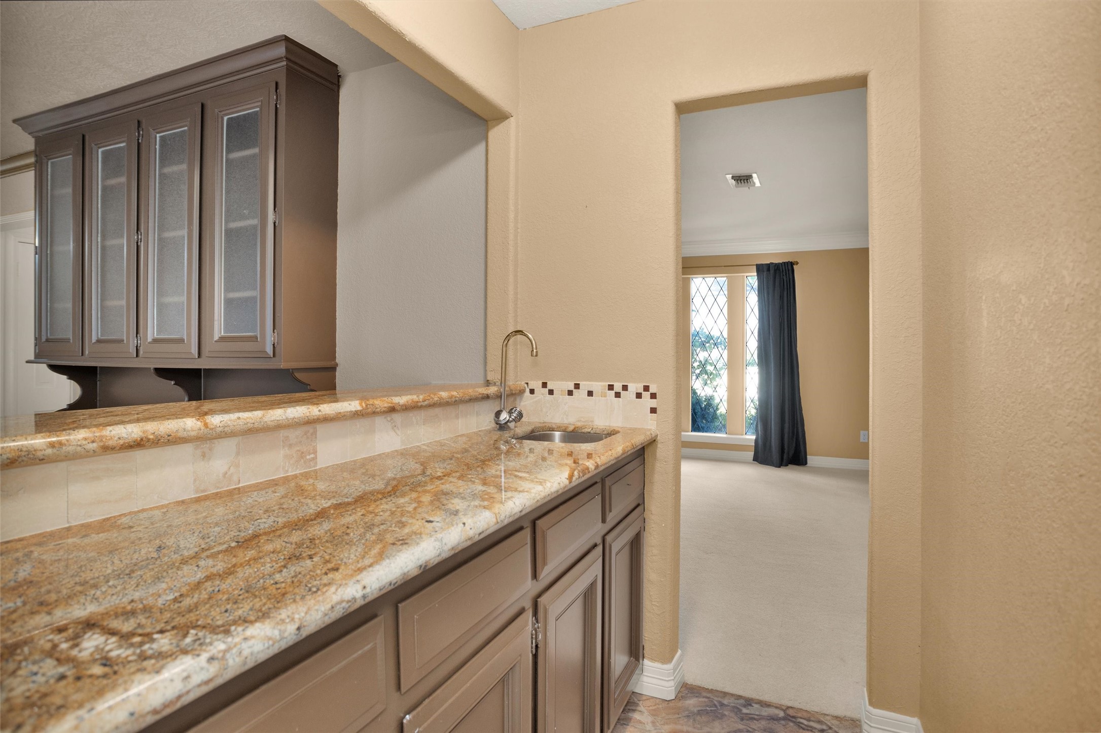 6903 Farnaby Court Spring, TX 77379 - Photo 14 of 49 a bathroom with a granite countertop sink and a mirror