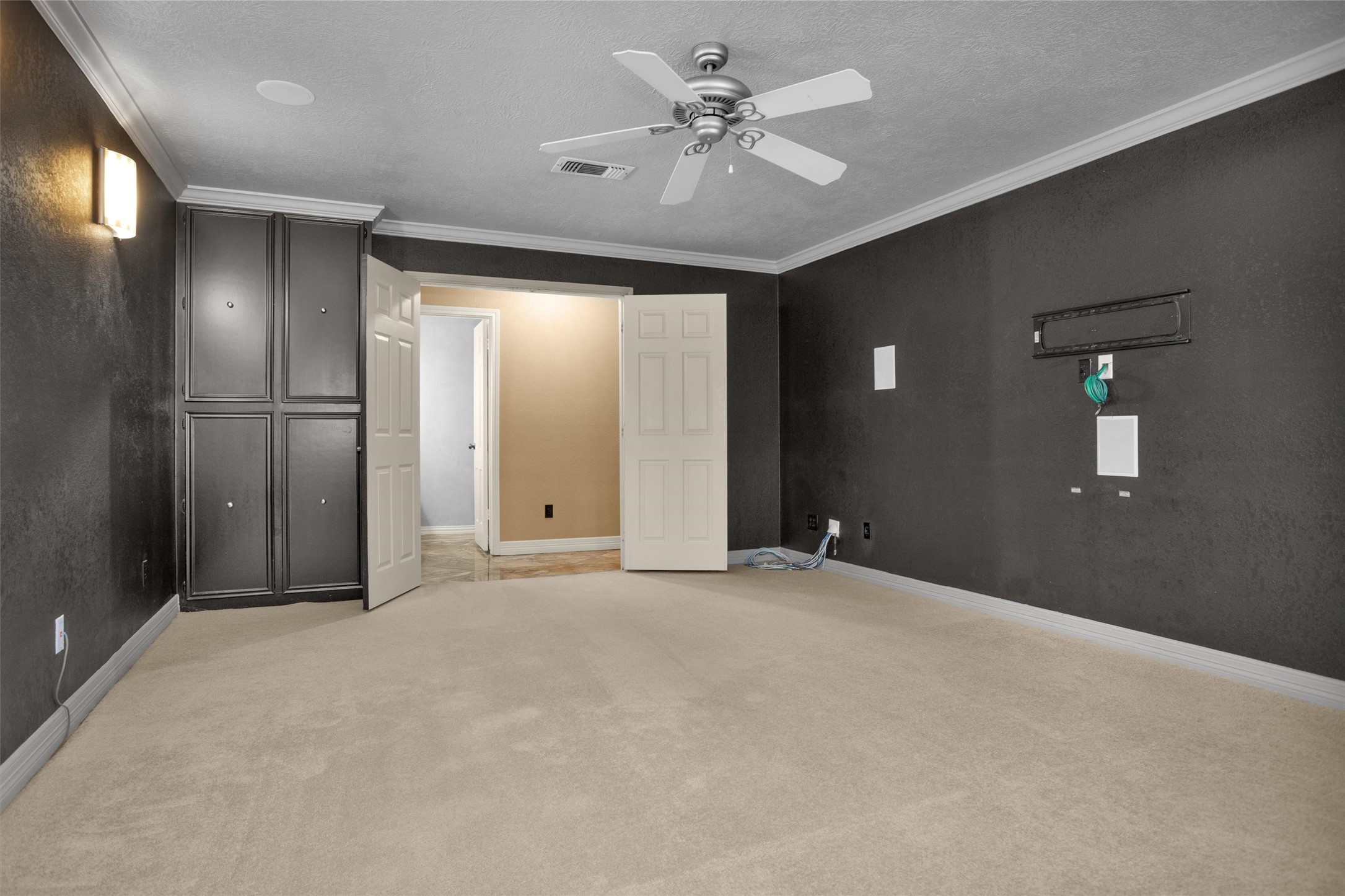 6903 Farnaby Court Spring, TX 77379 - Photo 22 of 49 a view of an empty room with a ceiling fan